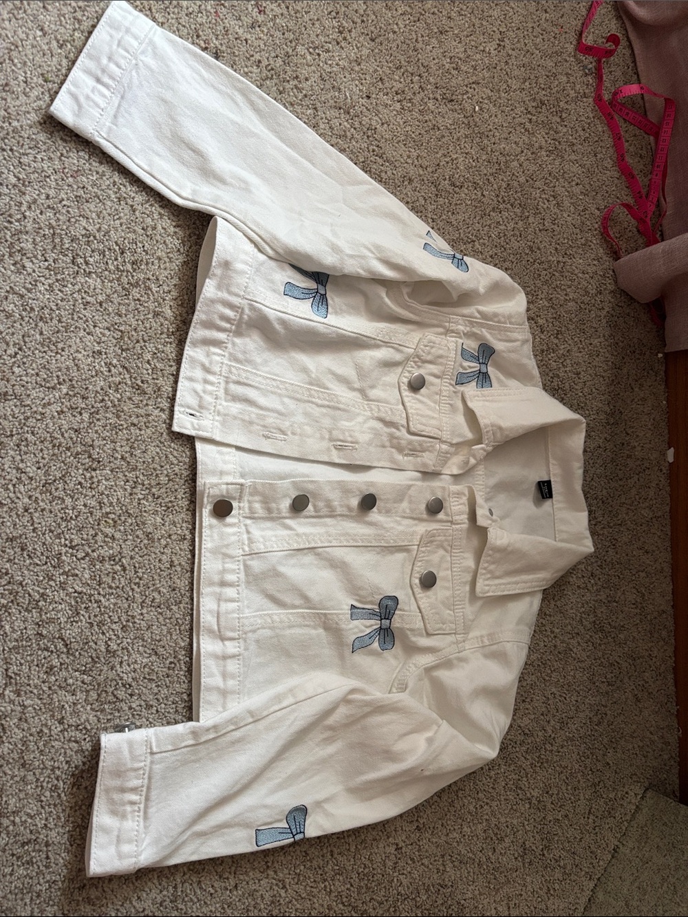SHEIN White Denim Jacket with Light Blue Bow Appliqués